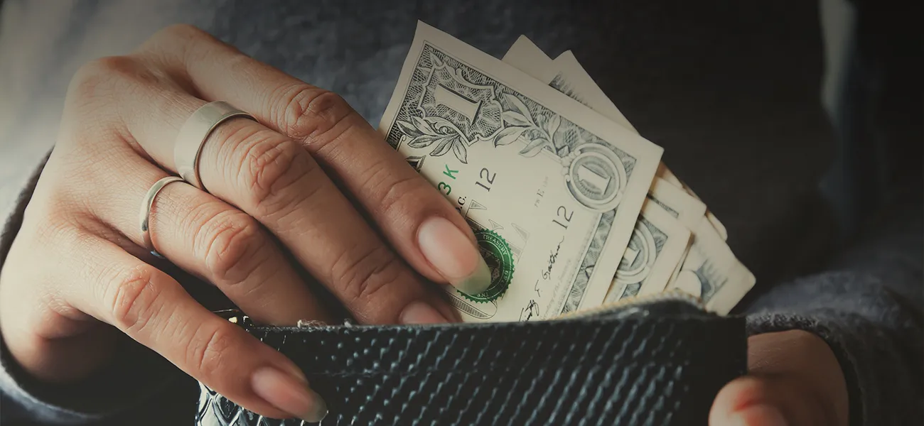 Hands holding cash