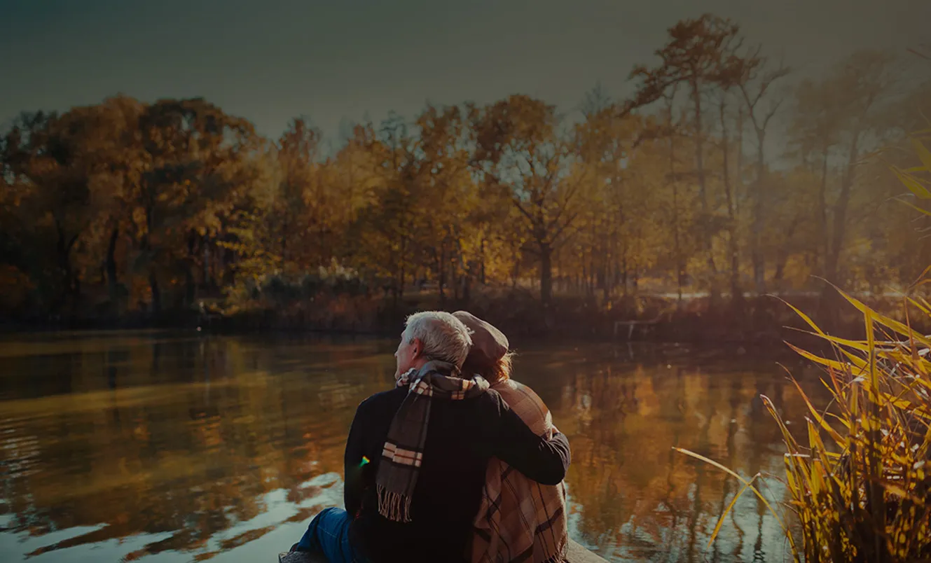 couple at lake in fall